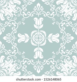 Floral vector light blue and white ornament. Seamless abstract classic background with flowers. Pattern with repeating floral elements. Ornament for fabric, wallpaper and packaging