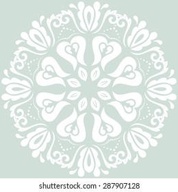 Floral vector oriental pattern with arabesques and floral elements. Light blue and white abstract ornament