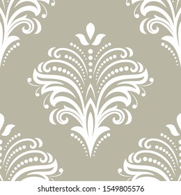 Floral vector ornament. Seamless abstract classic background with flowers. Pattern with repeating floral white elements. Ornament for fabric, wallpaper and packaging