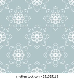 Floral vector ornament. Seamless abstract light blue and white background with fine pattern