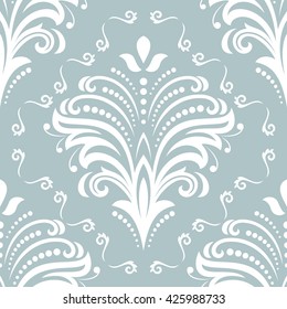Floral vector ornament. Seamless abstract classic pattern with flowers. Light blue and white pattern