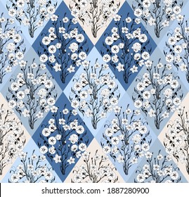 The floral vector pattern is seamless with rhombuses. Pattern for fabric in light blue colors.