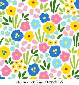 Floral vector seamless pattern. Bright multi-colored field flowers, grass on a white background. For fabric prints, textile products. Spring summer collection.