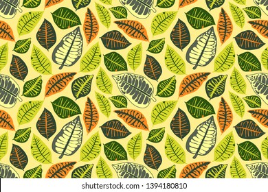 Floral vector seamless pattern with colorful leaves on pale yellow background. Isolated elements.