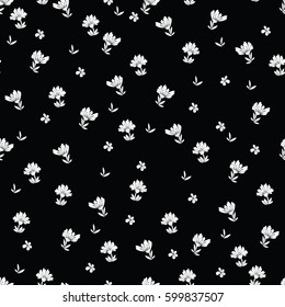 Floral vector seamless pattern. Daisy, lilly, chrysanthemum graphic flowers in black and white. For textile, design, book, diary covers, wallpapers, print, gift packaging and scrapbook. Millefleurs.