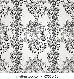 Floral vertical pattern, doodles,bagels, branches, leaves, seamless, copy space . Hand drawn. Gray background. Vector illustration.