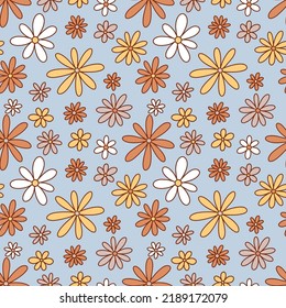 Floral vintage seamless pattern. Boho vector background. Hippie flower power retro textile print. Groovy botanical wallpaper.