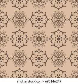 Floral wallpaper. Brown seamless pattern as textile background
