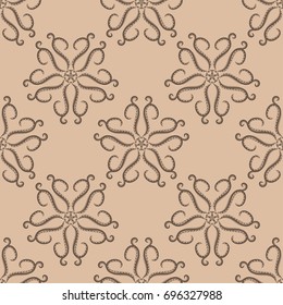 Floral wallpaper. Brown seamless pattern as textile background