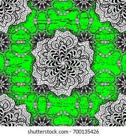 Floral wallpaper. White element on green background. Damask background. White white floral ornament in baroque style.