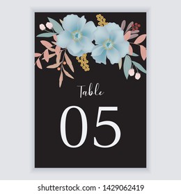 Floral wedding table number with pastel blue color flower and golden leaf bouquet. Great for bridal party and event decoration.