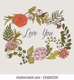 Floral wreath enclosing LOVE YOU