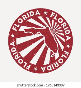 Florida stamp. Travel red rubber stamp with the map of US state, vector illustration. Can be used as insignia, logotype, label, sticker or badge of Florida.