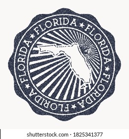 Florida stamp. Travel rubber stamp with the name and map of the US state, vector illustration. Can be used as insignia, logotype, label, sticker, or badge of Florida.