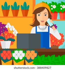 Florist taking order.