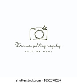 Flourish leaf lens camera with sprout trigger photography logo design template