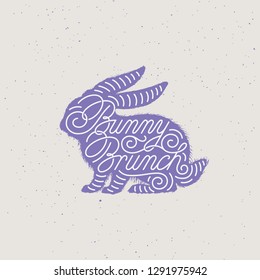 Flourish lettering Bunny Brunch in silhouette of bunny for greeting card, invitation, poster, banner template. Vector illustration.