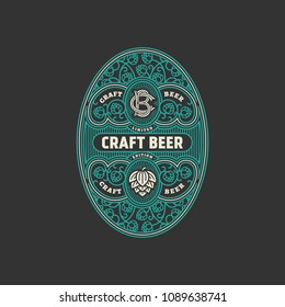 Flourishes oval beer label design template with hops. Vector illustration.