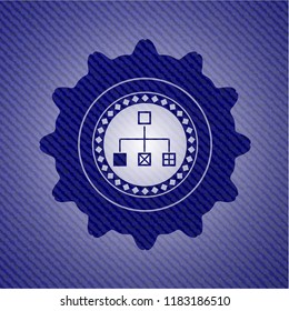 flowchart icon inside emblem with jean background