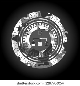 flowchart icon inside grey camouflage emblem