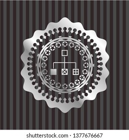 flowchart icon inside silvery badge or emblem