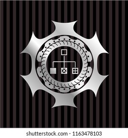 flowchart icon inside silvery emblem