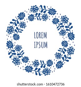Flower arrangement with a round frame in blue and space for your text. Abstract natural background color of the trend.