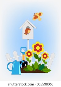 flower beds and bird house