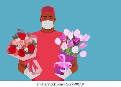 Flower bouquet delivery. African American courier holding roses and tulips. Safe, sterile flower service. Wearing medical mask and gloves against covid-19.