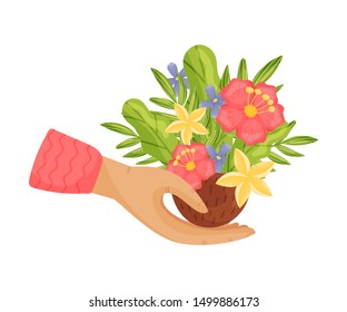 Flower bouquet in half a coconut. Vector illustration on a white background.