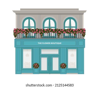 Flower boutique. Facade of a flower shop. florist shop facade decorated with flowers. Vintage boutique. Building with a balcony decorated with flowers