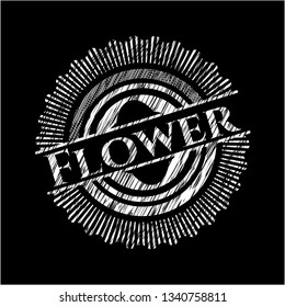Flower chalk emblem written on a blackboard