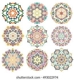 Flower design. Decorative round ornaments. Colorful mandala set. Boho decoration. Unusual flourish embellishments. Oriental style. Isolated floral patterns. Hand-drawn vector elements.