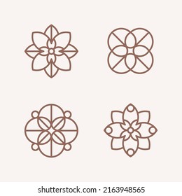 Flower design element. Set of 4 geometric shape. Modern linear design emblem.  Modern abstract linear compositions and graphic design elements.