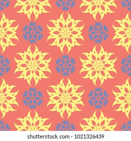 Flower design seamless pattern. Bright yellow and blue flower elements on salmon red background for wallpapers and textile