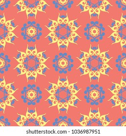 Flower design seamless pattern. Bright yellow and blue flower elements on salmon red background for wallpapers and fabrics