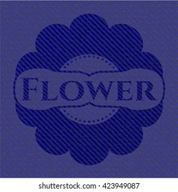 emblema de la flor con fondo jean