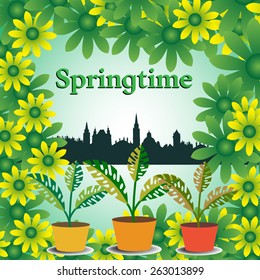 Flower frame with city view and three decorative flowers on the lower side of the image. Springtime concept