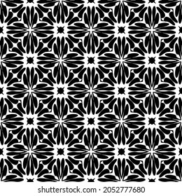 Flower geometric pattern. Seamless vector background. White and black ornament. Ornament for fabric, wallpaper, packaging. Decorative print.
