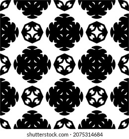 Flower geometric pattern. Seamless vector background. White and black ornament. Ornament for fabric, wallpaper, packaging. Decorative print.