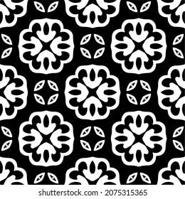 Flower geometric pattern. Seamless vector background. White and black ornament. Ornament for fabric, wallpaper, packaging. Decorative print.