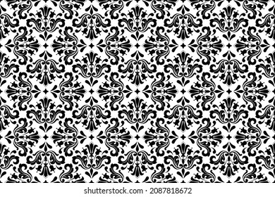 Flower geometric pattern. Seamless vector background. White and black ornament