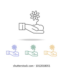 flower in the hand icons. Element of ecology for mobile concept and web apps. Thin line  icon for website design and development, app development. Premium multicolor icons on white background