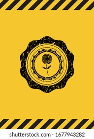 flower icon black grunge emblem with yellow background. Vector Illustration. Detailed.