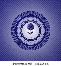 flower icon inside badge with denim background