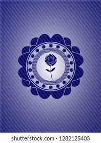 flower icon inside badge with jean texture