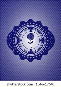 flower icon inside badge with jean texture