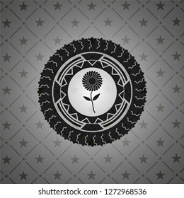 flower icon inside black badge