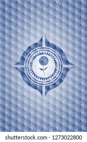 flower icon inside blue emblem with geometric background.