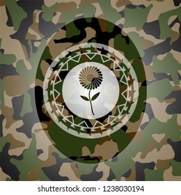 flower icon inside camouflaged emblem